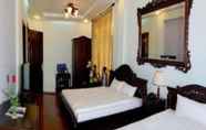 Bedroom 4 Nhat Le Hotel