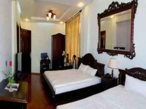 Kamar Tidur 4 Nhat Le Hotel