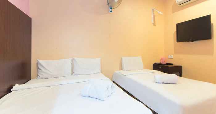 Kamar Tidur GS Inn Hotel