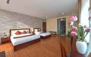 Kamar Tidur 4 Tan Binh Hotel Quang Binh