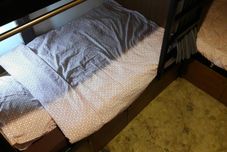 침실 Rachanatda Hostel