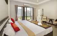 ห้องนอน 4 Royal Q & D Suites Hotel