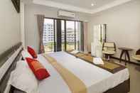 Bedroom Royal Q & D Suites Hotel
