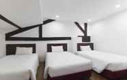 Kamar Tidur 3 Charlie's Budget Hotel