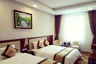 ห้องนอน Grand Hotel Hoa Binh