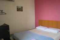 ห้องนอน Budget & Comfort Hostel Kuching
