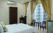 Phòng ngủ 4 Huong Binh Hotel