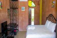 Kamar Tidur River & Flowers Resort 