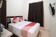 Bedroom OYO 765 Wisma Andalas Asri Syariah