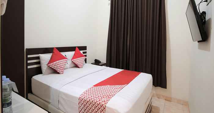 Bedroom OYO 765 Wisma Andalas Asri Syariah