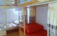 Kamar Tidur 4 Cherry Balcony Homestay