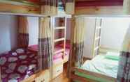 Kamar Tidur 3 Cherry Balcony Homestay