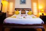 Bedroom Grand Manita Beach Resort