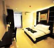 Kamar Tidur 7 The Next Grand Hotel