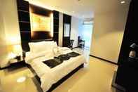 Kamar Tidur The Next Grand Hotel