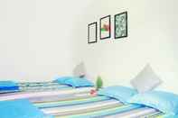 Kamar Tidur Mint Garden Homestay