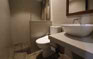 In-room Bathroom 6 Akila Hotel
