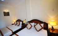 Kamar Tidur 7 Ham Luong Hotel Ben Tre