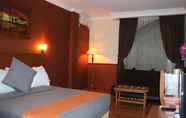 Kamar Tidur 3 Iscalton Courteous Hotel