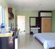 Kamar Tidur 5 The Four Lights Apartment