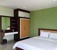 Kamar Tidur 6 The Four Lights Apartment