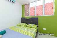 Kamar Tidur Hotel Sunbeam Palm