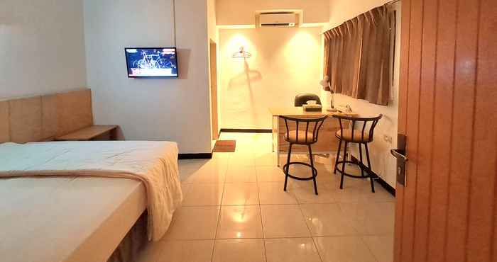 Kamar Tidur De Mawar Hotel