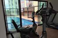 Ruang Umum Modern Bright Serviced Apartment