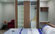 Kamar Tidur 5 Modern Bright Serviced Apartment