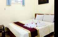 Kamar Tidur 4 Quy Long Hoi An Homestay