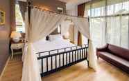 ห้องนอน 4 The Farm House Hotel