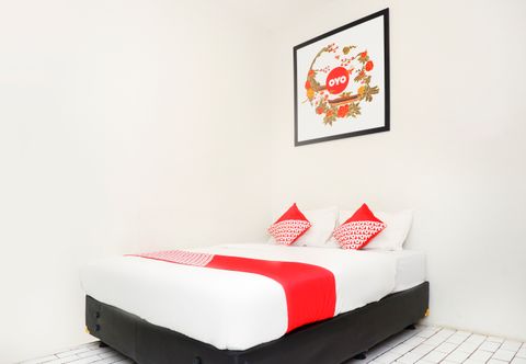 Kamar Tidur OYO 422 Achterhuis Guesthouse