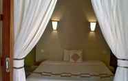 Phòng ngủ 5 Grand Desa Resort Cimaja