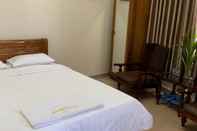 ห้องนอน Dong Nghi Hotel Bao Loc