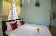 Kamar Tidur 3 Pink Buds Homestay