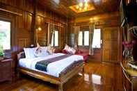 ห้องนอน Bueng Bua Thong Resort