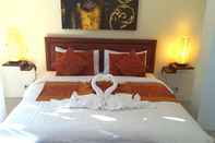 ห้องนอน Dreams Villa Resort