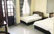 Kamar Tidur 3 Cat Phu Hotel