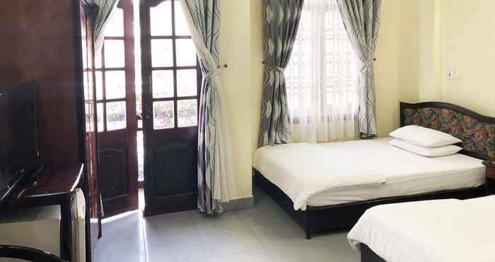 Kamar Tidur Cat Phu Hotel