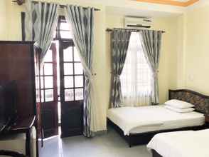 Kamar Tidur 4 Cat Phu Hotel