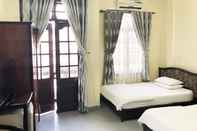 Kamar Tidur Cat Phu Hotel