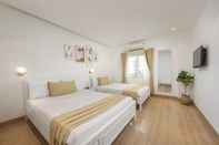 ห้องนอน Amunra Hotel