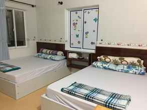 Kamar Tidur 4 Quang Nga Hotel