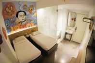 Kamar Tidur Grab Hotel Gresik