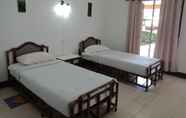 ห้องนอน 5 Holiday Resort
