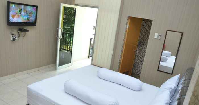 Bedroom Lingga Inn Penginapan Keluarga