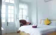 Kamar Tidur 2 Vivid Seaside Homestay