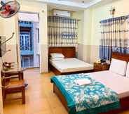 Bedroom 4 Ngoc Trinh Hotel
