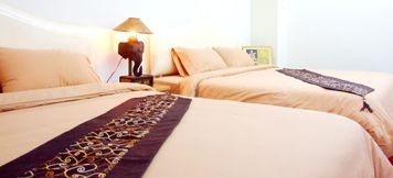 ห้องนอน 3 Queen Palace Hotel
