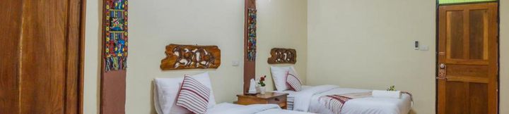 ห้องนอน 4  MitKhoonYoum Hotel